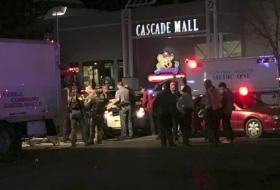 Washington shooting: police hunt gunman after three people killed in mall attack 